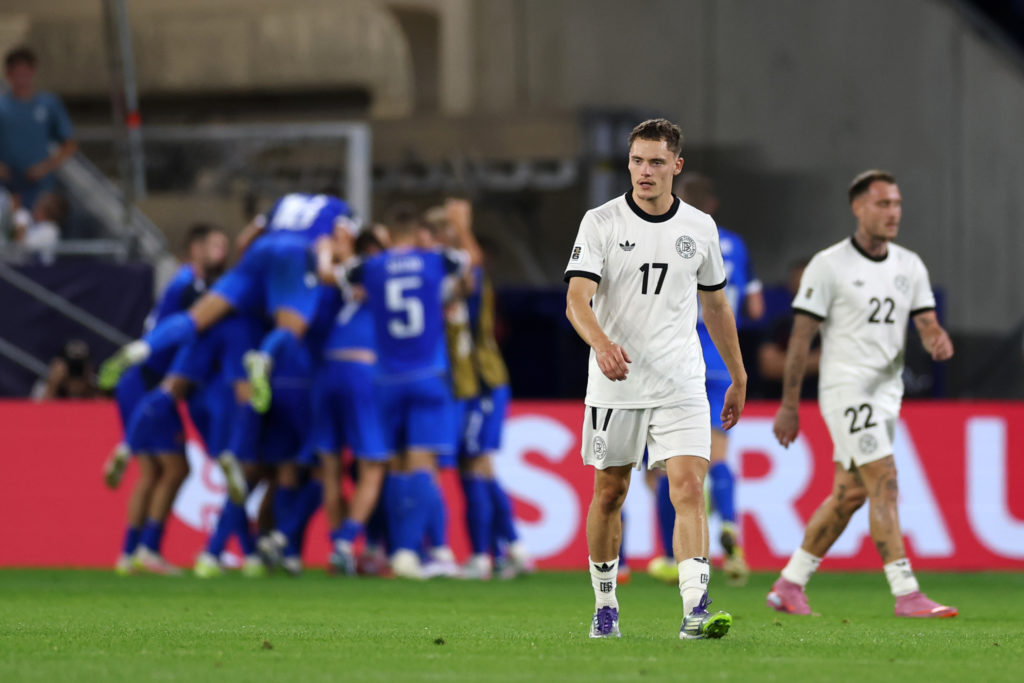 Florian Wirtz reacts after seeing Slovakia score their second goal of the game during the FIFA World Cup qualifier against Germany in Bratislava