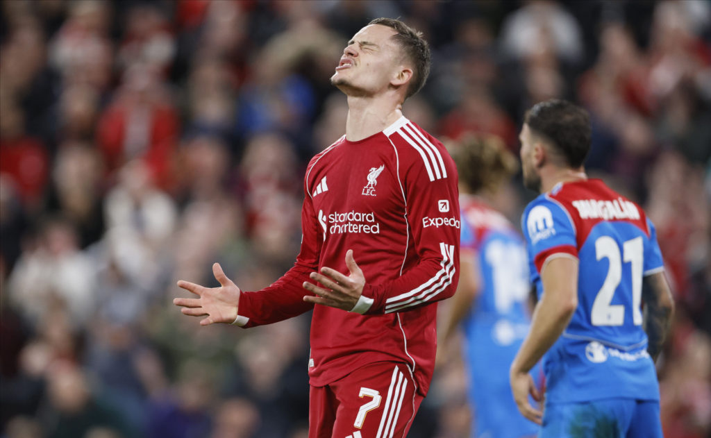 Florian Wirtz looks to the sky in frustration during Liverpool's UEFA Champions League match against Atletico Madrid at Anfield.