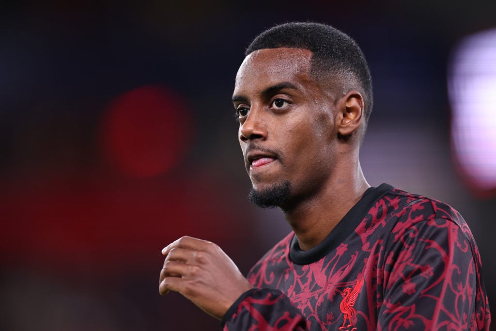 Alexander Isak warms up ahead of Liverpool's UEFA Champions League match against Atletico Madrid at Anfield