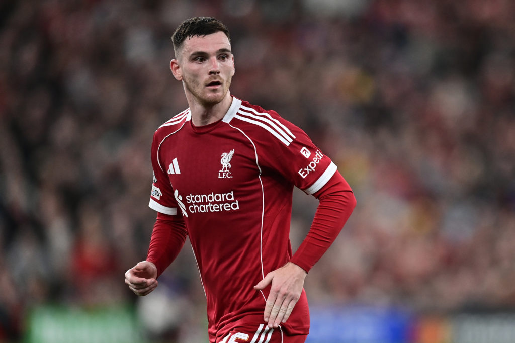 Andy Robertson running on the pitch against Atletico Madrid