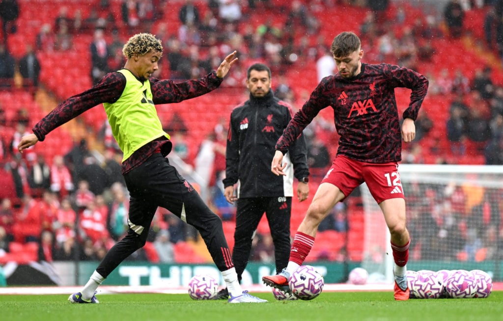 Hugo Ekitike and Conor Bradley of Liverpool warm up prior to the Premier League match between Liverpool and Everton at Anfield.