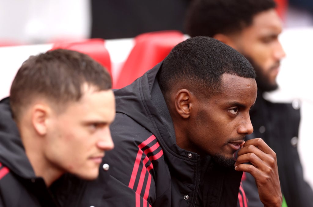 Alexander Isak of Liverpool looks on from the substitutes bench prior to the Premier League match between Liverpool and Everton at Anfield on September 20.