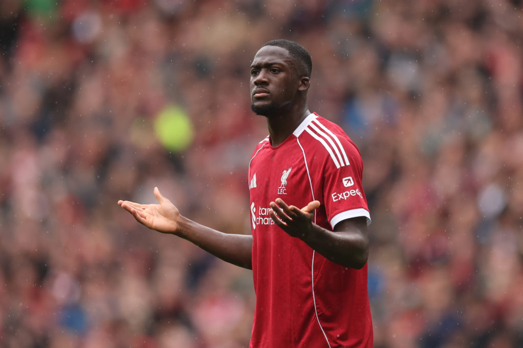 Ibrahima Konate lifts his hands during Everton game