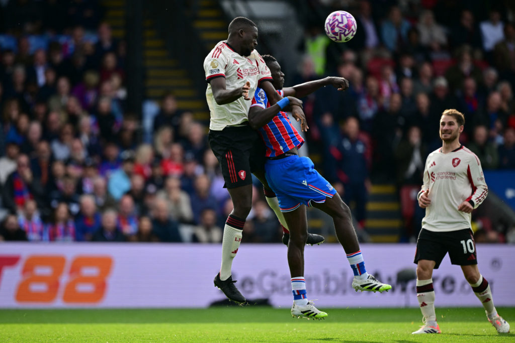 Ibrahima Konate heads the ball