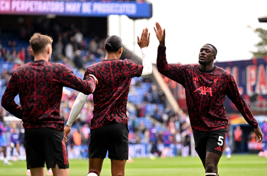 Virgil van Dijk and Ibrahima Konate of Liverpool interact prior to the Premier League match between Crystal Palace and Liverpool at Selhurst Park on September 27, 2025 in London, England.