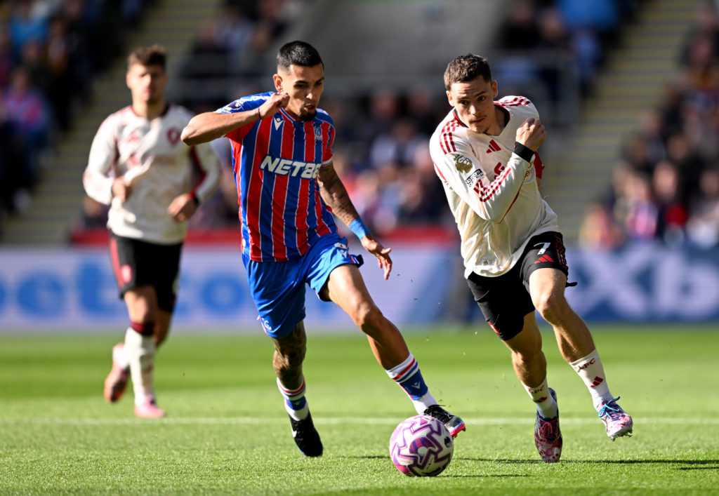 Florian Wirtz of Liverpool runs ahead of Daniel Munoz of Crystal Palace during the Premier League match between Crystal Palace and Liverpool at Selhurst Park.