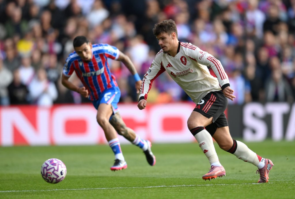 Milos Kerkez runs with the ball during Liverpool's Premier League match against Crystal Palace at Selhurst Park.