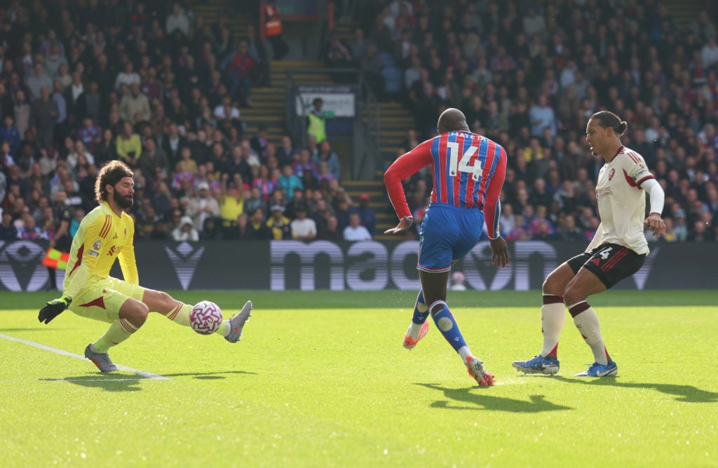 Alisson Becker of Liverpool saves a shot from Jean-Philippe Mateta of Crystal Palace during the Premier League match between Crystal Palace and Liverpool at Selhurst Park on September 27, 2025.