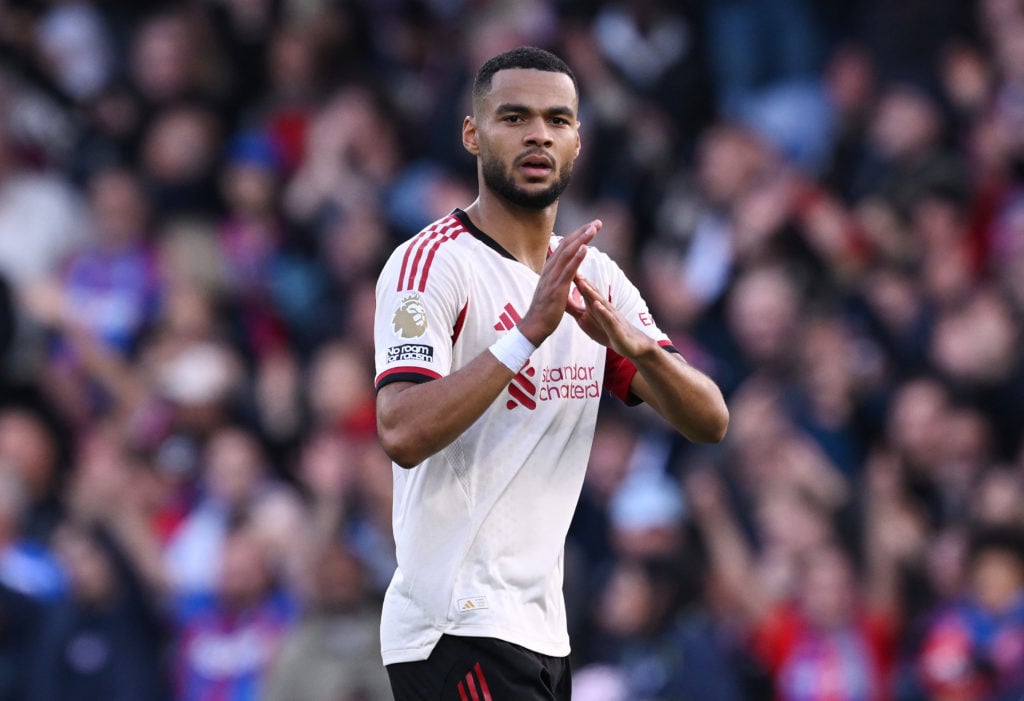 Cody Gakpo makes a T signal with his hands during Crystal Palace game
