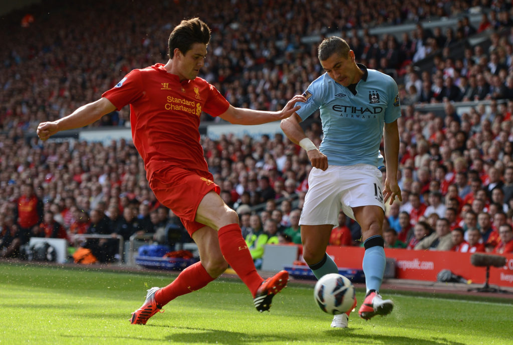 Martin Kelly for Liverpool tackling Manchester City player