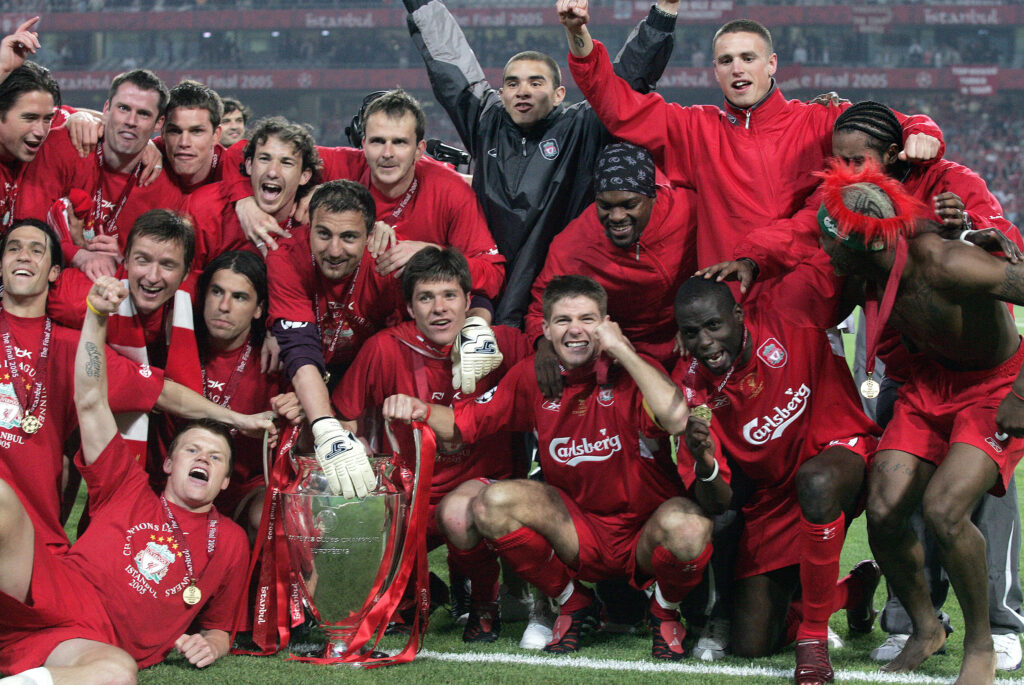 Liverpool players celebrate as they pose with the Champions League trophy after the 2005 final in Istanbul
