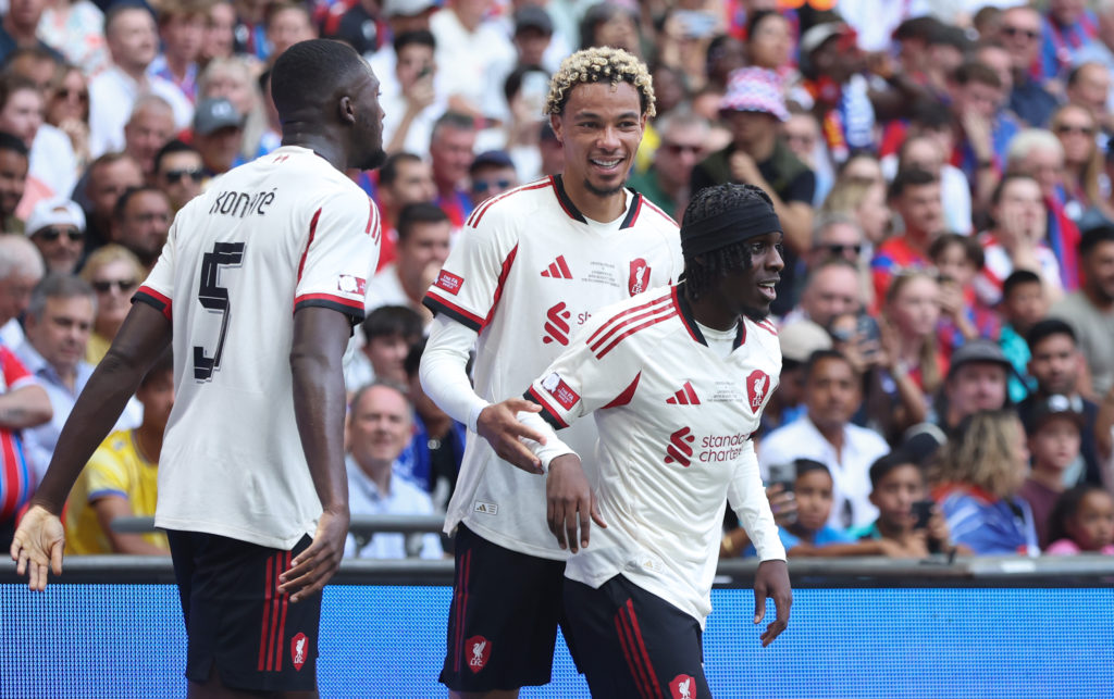 Liverpool's Jeremie Frimpong celebrates scoring his side's second goal with Ibrahima Konate and Hugo Ekitike during the 2025 FA Community Shield match between Crystal Palace and Liverpool at Wembley Stadium