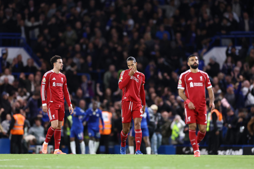 Dominik Szoboszlai of Liverpool (L), Virgil van Dijk of Liverpool (C) and Mohamed Salah of Liverpool look dejected during the Premier League match between Chelsea and Liverpool at Stamford Bridge