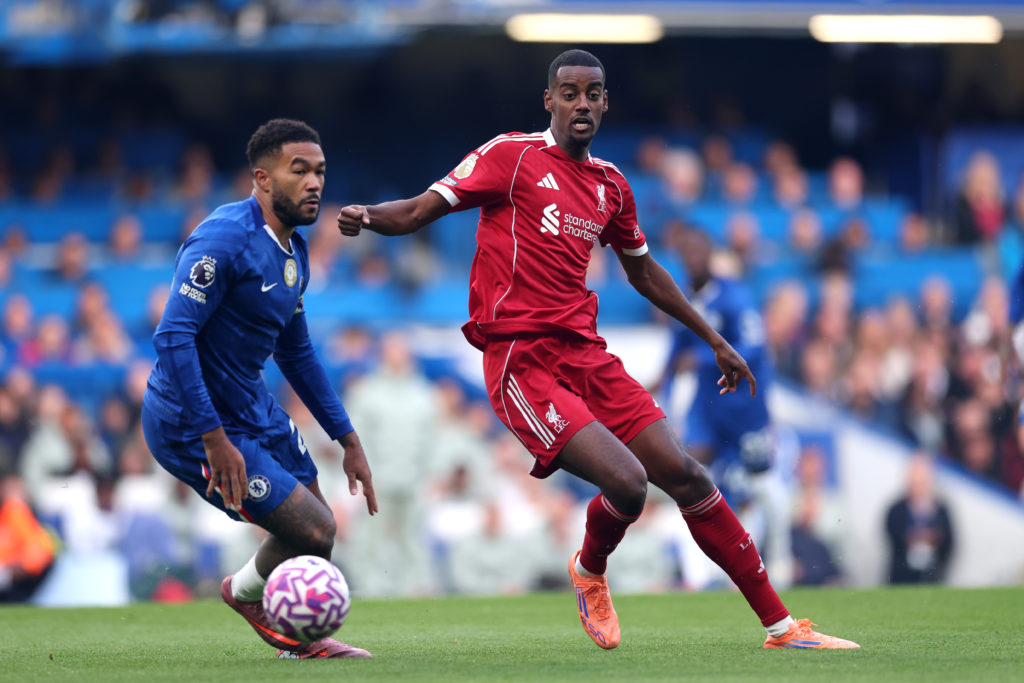 Alexander Isak of Liverpool battles for possession with Reece James of Chelsea during the Premier League match between Chelsea and Liverpool at Stamford Bridge on October 04, 2025 in London.