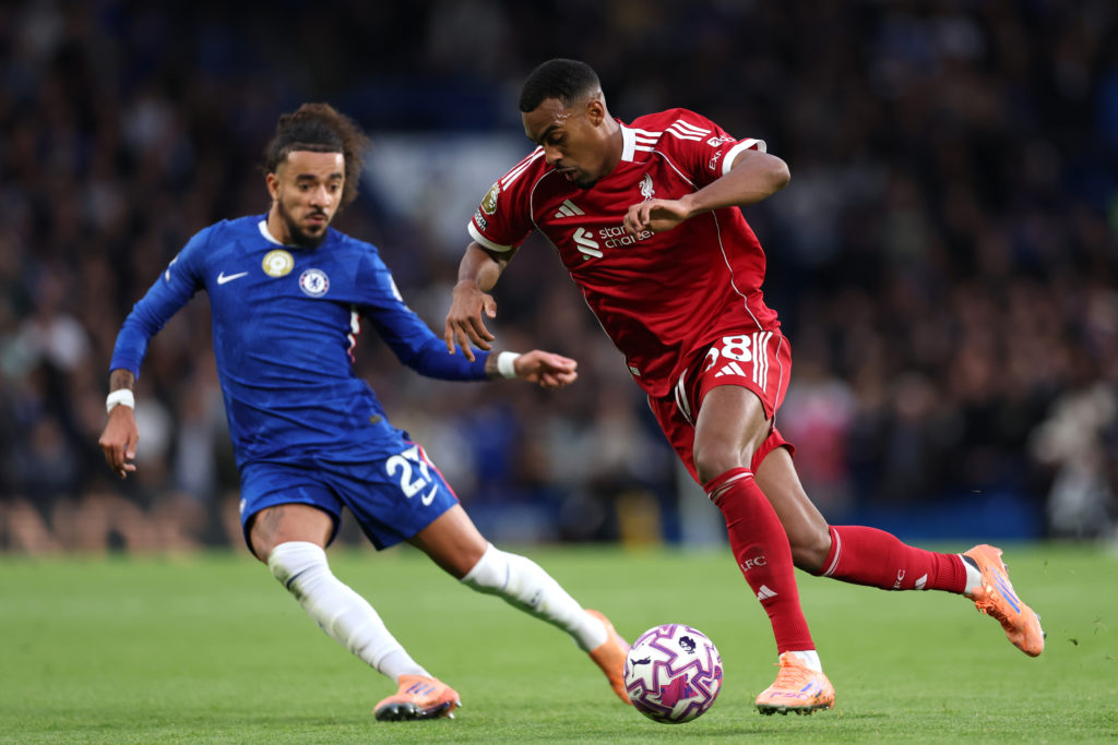 Ryan Gravenberch of Liverpool runs with the ball whilst under pressure from Malo Gusto of Chelsea during the Premier League match between Chelsea and Liverpool at Stamford Bridge