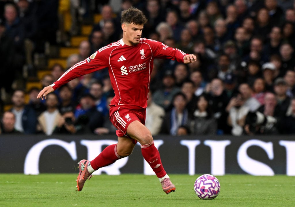 Milos Kerkez of Liverpool runs with the ball during the Premier League match between Chelsea and Liverpool at Stamford Bridge.