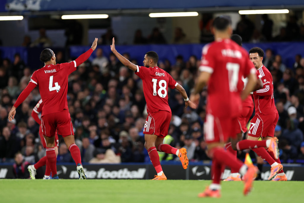 Virgil van Dijk high fives Cody Gakpo after Chelsea goal