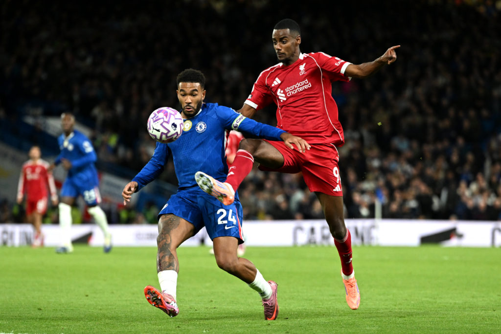 Alexander Isak challenges Reece James for the ball during Liverpool's Premier League match against Chelsea at Stamford Bridge.