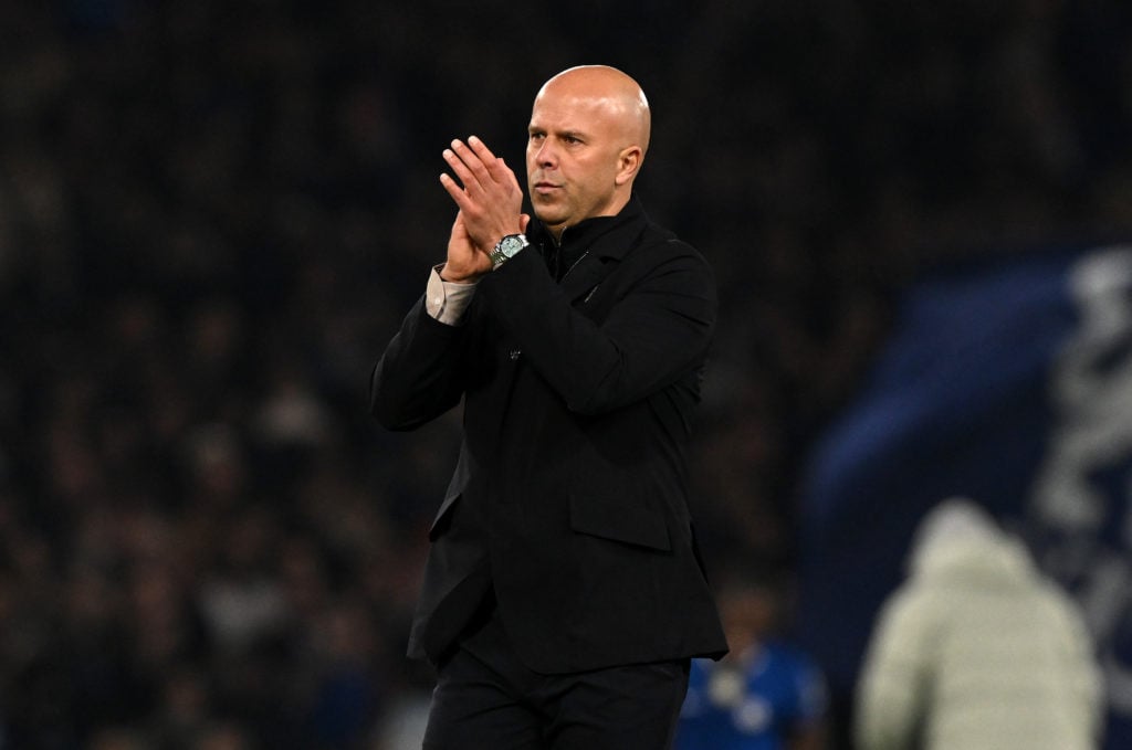 Arne Slot claps the travelling Liverpool fans after Chelsea defeat