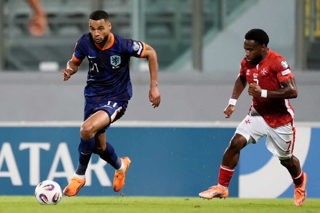 Cody Gakpo running with the ball against Malta