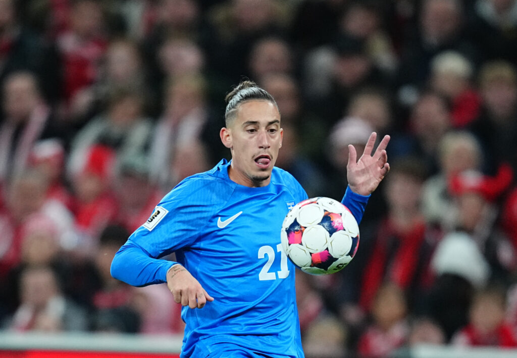 Kostas Tsimikas of Greece controls the ball during the UEFA World Cup qualification match between Denmark and Greece at Parken Stadium.