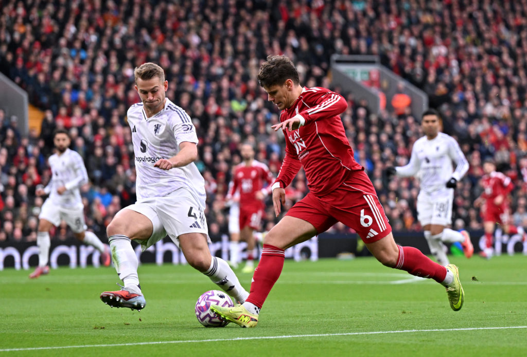 Milos Kerkez running with the ball in Liverpool v Manchester United