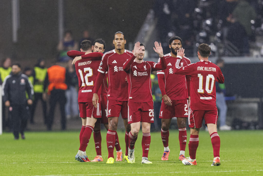 Liverpool players celebrate at the final whistle of their UEFA Champions League match against Eintracht Frankfurt at Deutsche Bank Park.