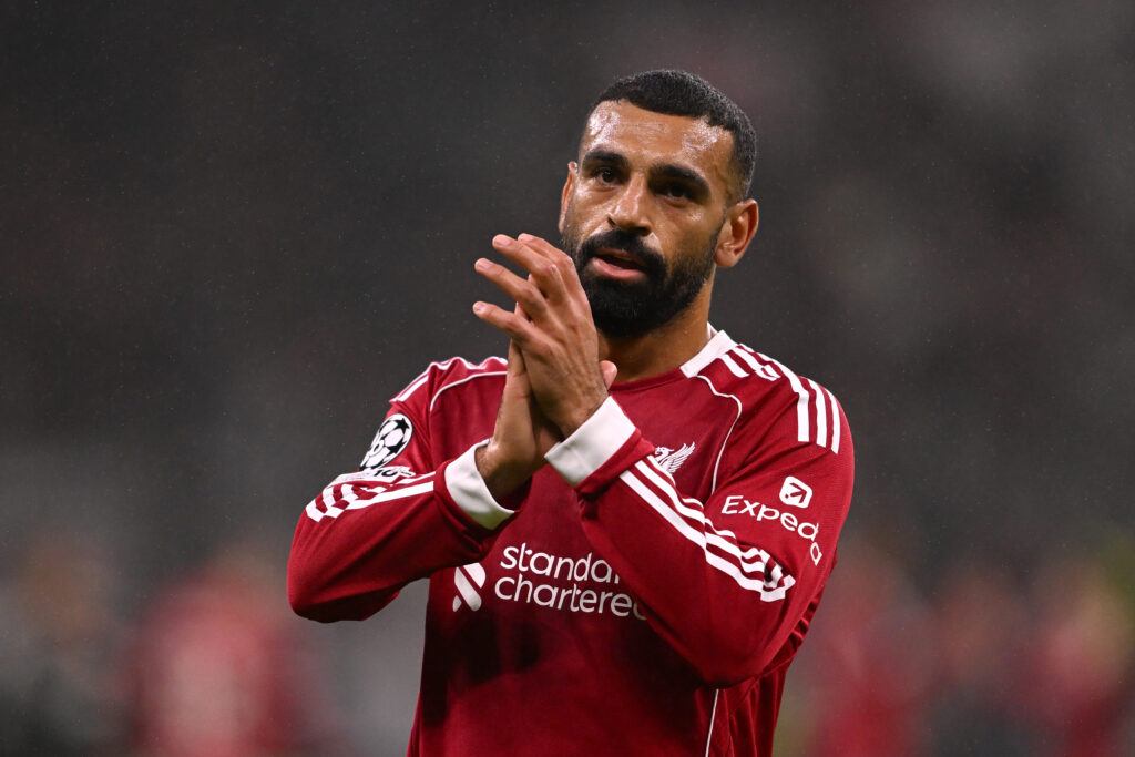 Mohamed Salah applauds after Liverpool's UEFA Champions League match against Eintracht Frankfurt at Deutsche Bank Park.