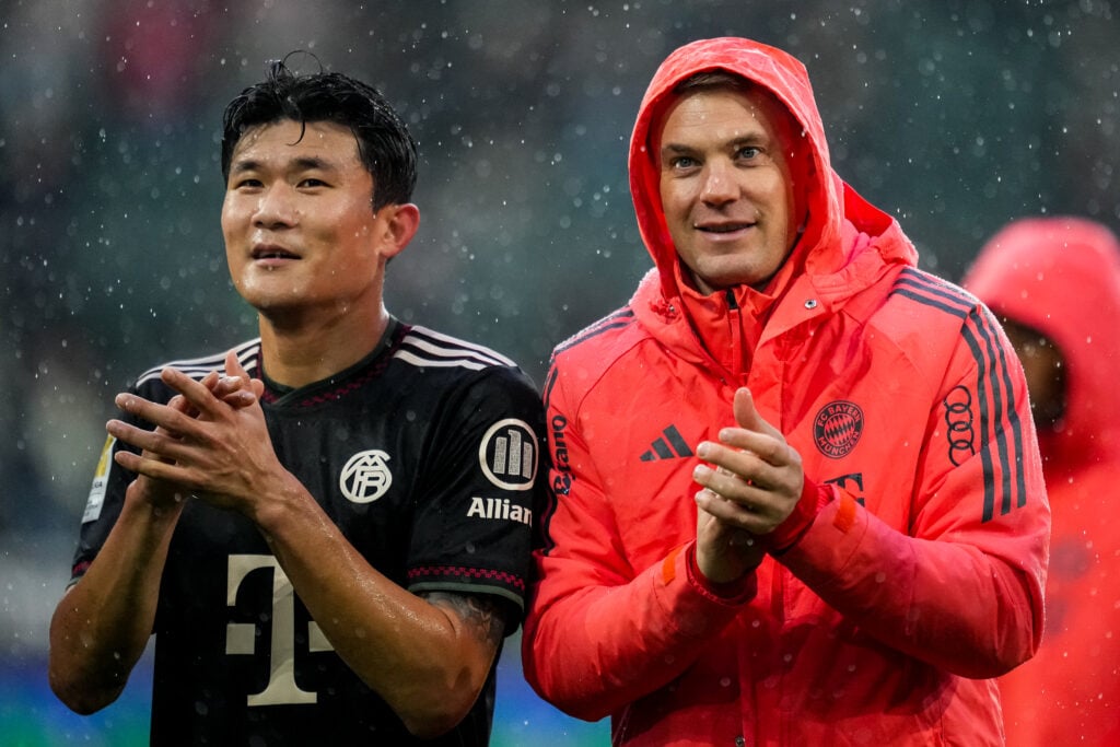 Kim Min-Jae of Bayern Munchen and Bayern Munchen goalkeeper Manuel Neuer applaud the fans after the Bundesliga match between Borussia Munchengladbach and FC Bayern Munchen at Borussia-Park.