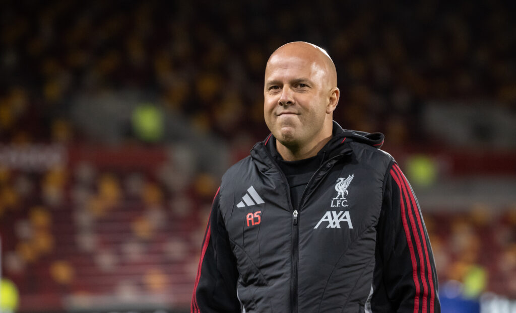 Liverpool's manager Arne Slot inspecting the pitch before the match during the Premier League match between Brentford and Liverpool at Gtech Community Stadium.