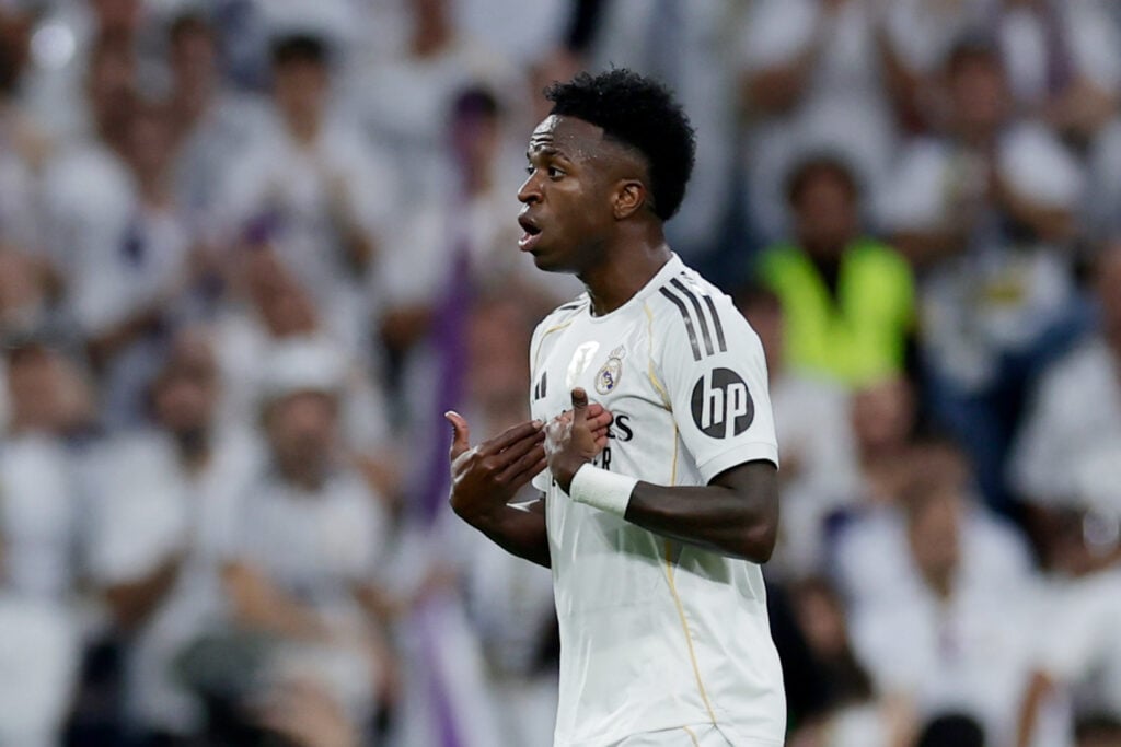 Vinicius Junior of Real Madrid reacts on his substitution during the LaLiga EA Sports match between Real Madrid v FC Barcelona at the Estadio Santiago Bernabeu