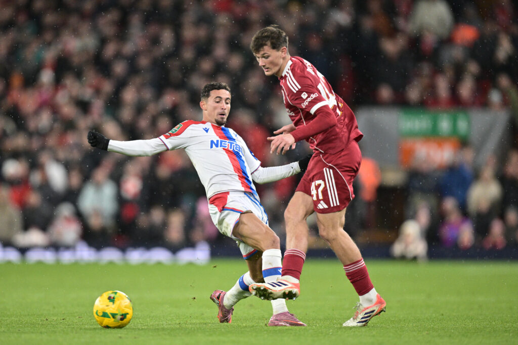 Calvin Ramsay passes the ball under pressure for Liverpool v Crystal Palace - Carabao Cup Fourth Round
