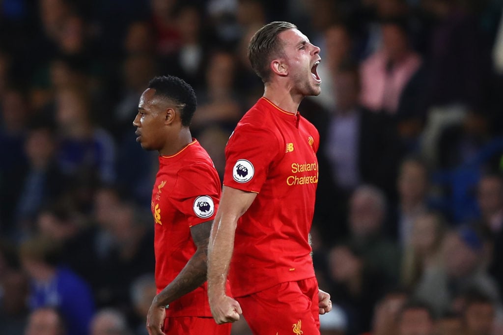 Jordan Henderson celebrates scoring for Liverpool against Chelsea in the Premier League at Stamford Bridge.