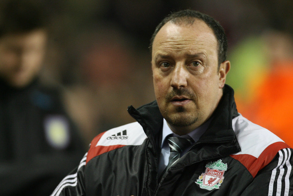Liverpool football manager Rafael Benitez takes his seat before their English Premiership football match against Aston Villa at Anfield, Liverpool, north-west England, 21 January 200