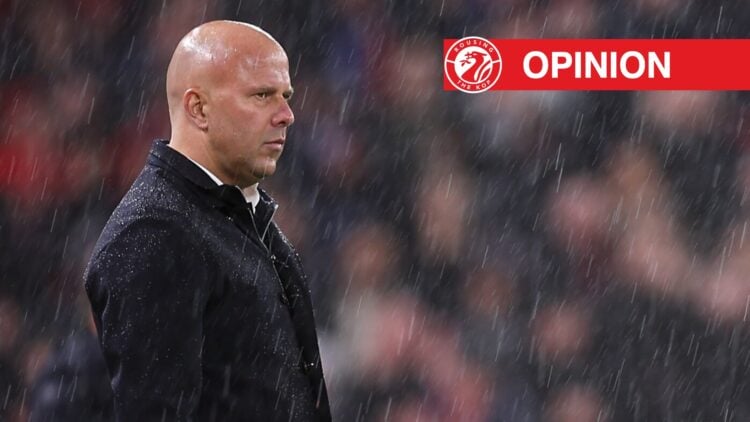 Liverpool Manager Arne Slot looks on as rain falls during the Carabao Cup Fourth Round match between Liverpool and Crystal Palace at Anfield