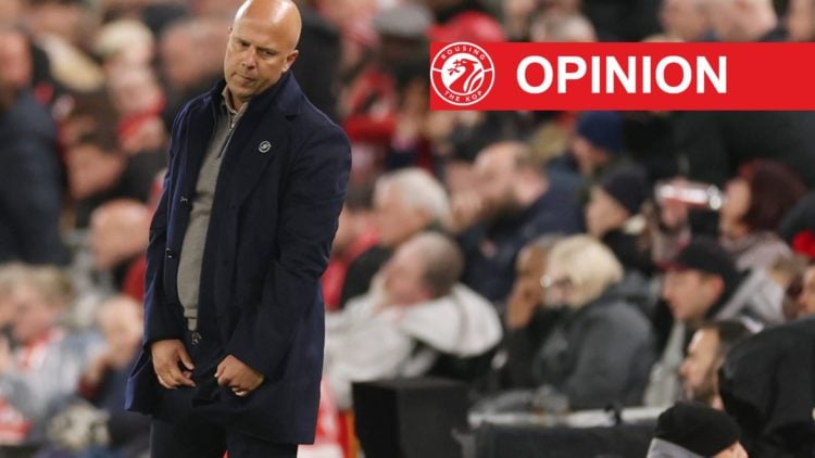 Arne Slot looks dejected during Liverpool's Premier League match against Manchester United at Anfield.