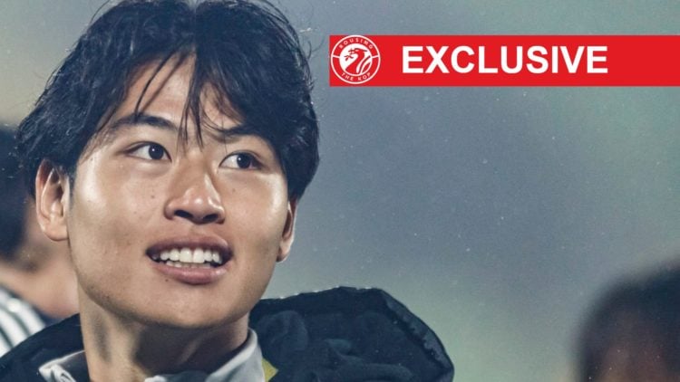 Japan U20 defender Rion Ichihara smiles in the rain after the U20 World Cup match against New Zealand.