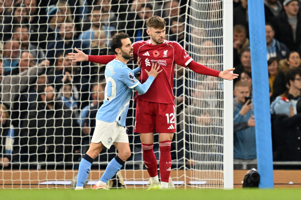Conor Bradley of Liverpool appeals ahead of Bernardo Silva of Manchester City during the Premier League match between Manchester City and Liverpool at Etihad Stadium
