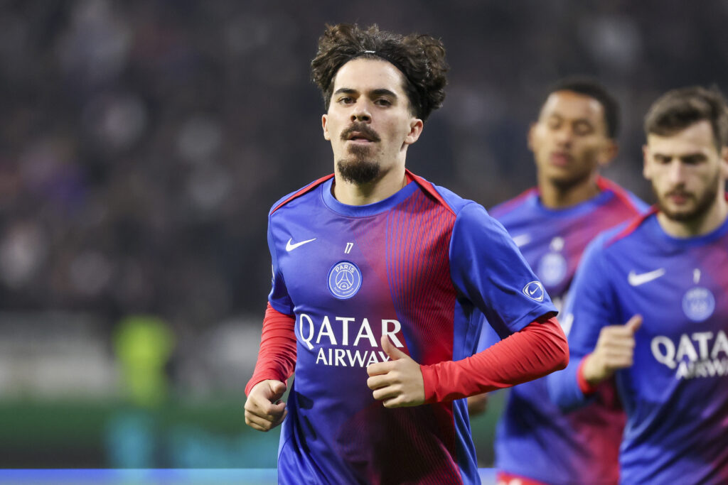 Vitinha #17 of Paris Saint-Germain warms up before the Ligue 1 McDonald's match between Olympique Lyonnais and Paris Saint-Germain at Groupama Stadium.