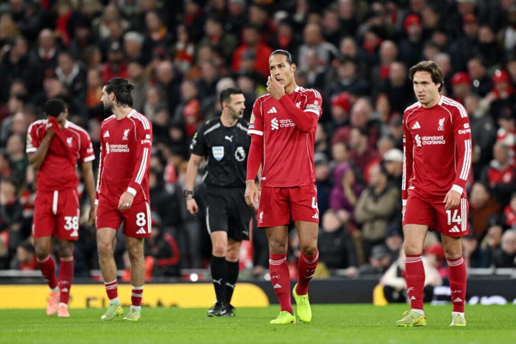 Liverpool players react after Nottingham Forest score a third goal during the Premier League match at Anfield.