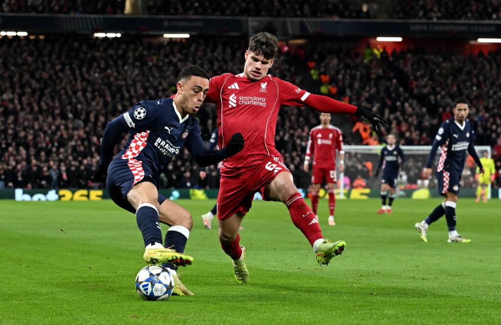 Milos Kerkez in action for Liverpool during their UEFA Champions League match against PSV Eindhoven at Anfield.