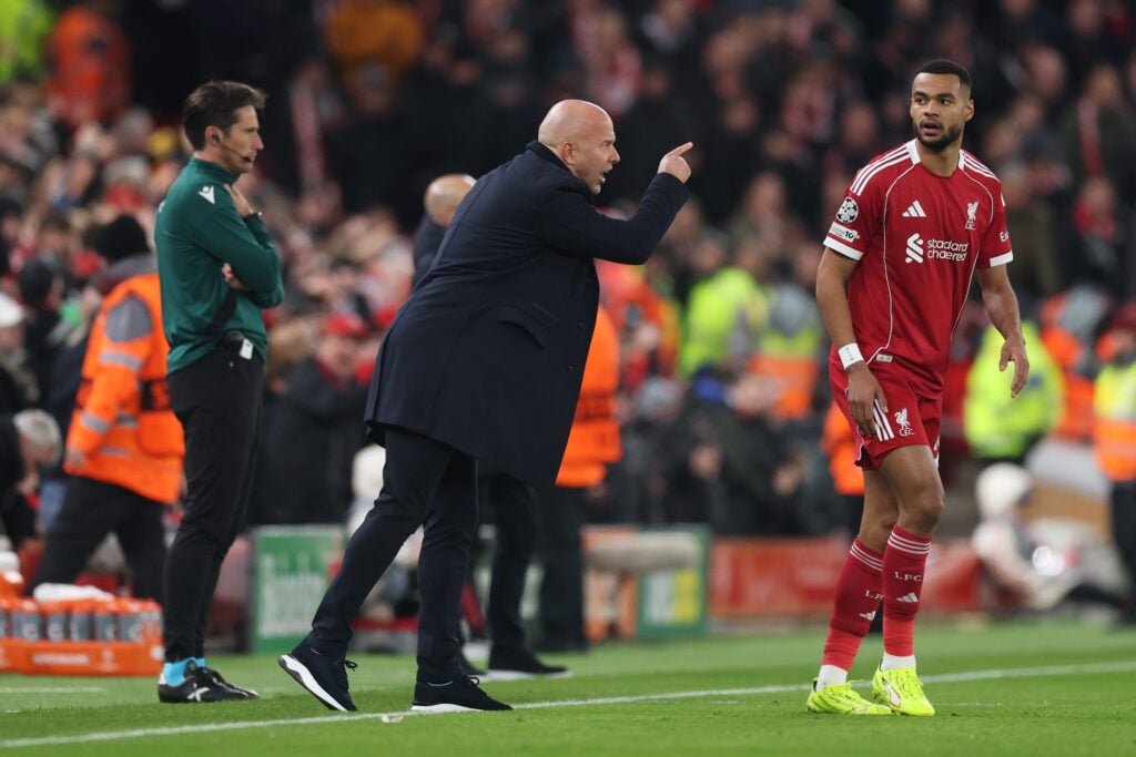 Arne Slot delivers instructions for Cody Gakpo during the UEFA Champions League match against Liverpool at Anfield.