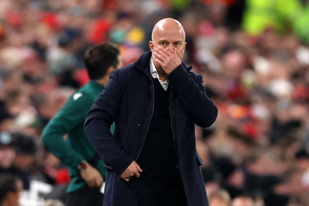 Arne Slot reacts during Liverpool's UEFA Champions League match against PSV Eindhoven at Anfield.