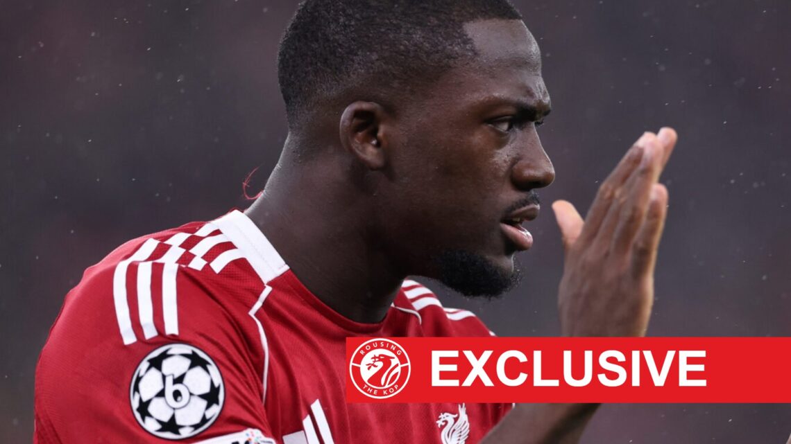 Ibrahima Konate applauds his teammates during Liverpool's UEFA Champions League match against Real Madrid at Anfield.