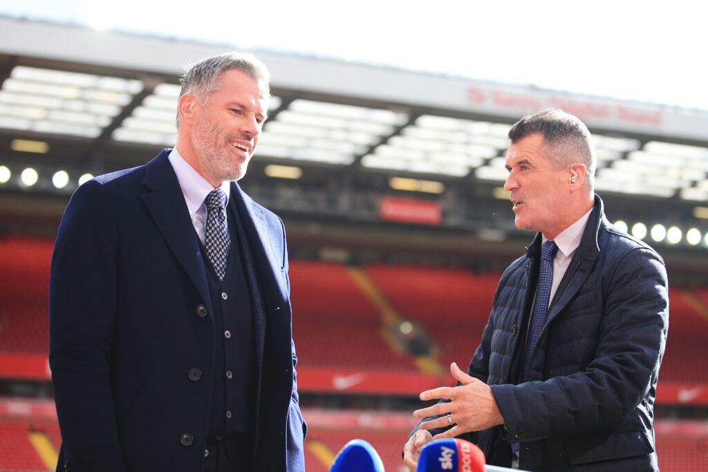 Jamie Carragher and Roy Keane talk to each other before the Premier League match between Liverpool and Manchester City