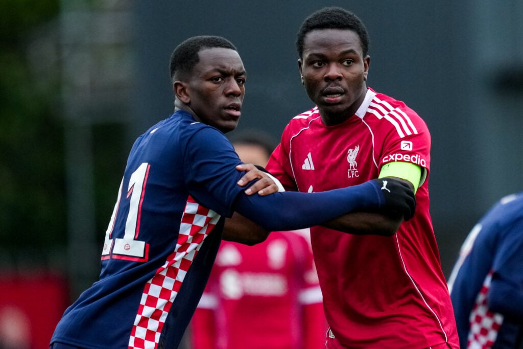 Wellity Lucky of Liverpool grapples with Manuel Bahaty during the UEFA Youth League match against PSV Eindhoven.