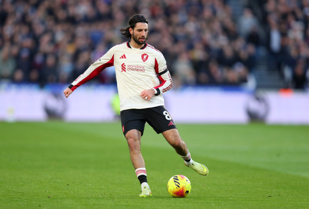 Dominik Szoboszlai passes the ball during Liverpool's Premier League match against West Ham United at the London Stadium.