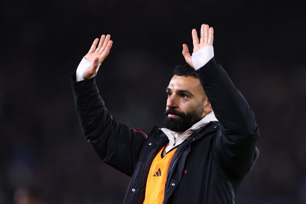 Mohamed Salah waves to supporters after Liverpool's Premier League match against Leeds United at Elland Road.