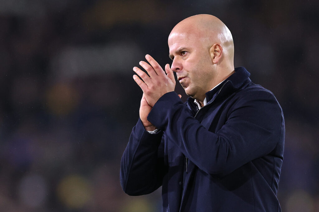 Arne Slot applauds fans after Liverpool's Premier League match against Leeds United at Elland Road.