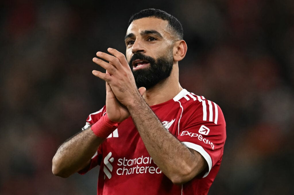 Liverpool's Egyptian striker #11 Mohamed Salah applauds the fans following the English Premier League football match between Liverpool and Brighton and Hove Albion at Anfield